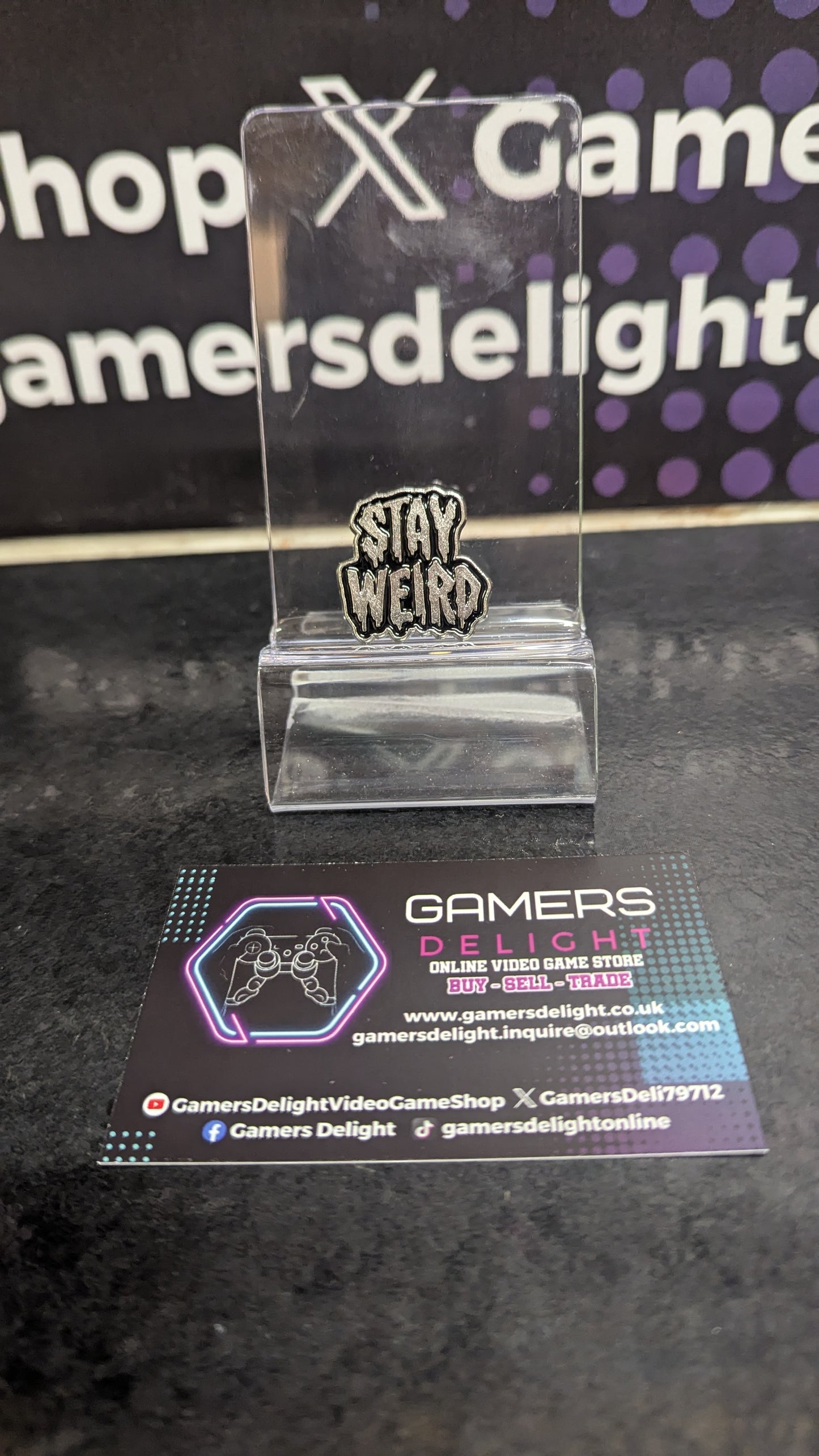 Stay weird pin badge