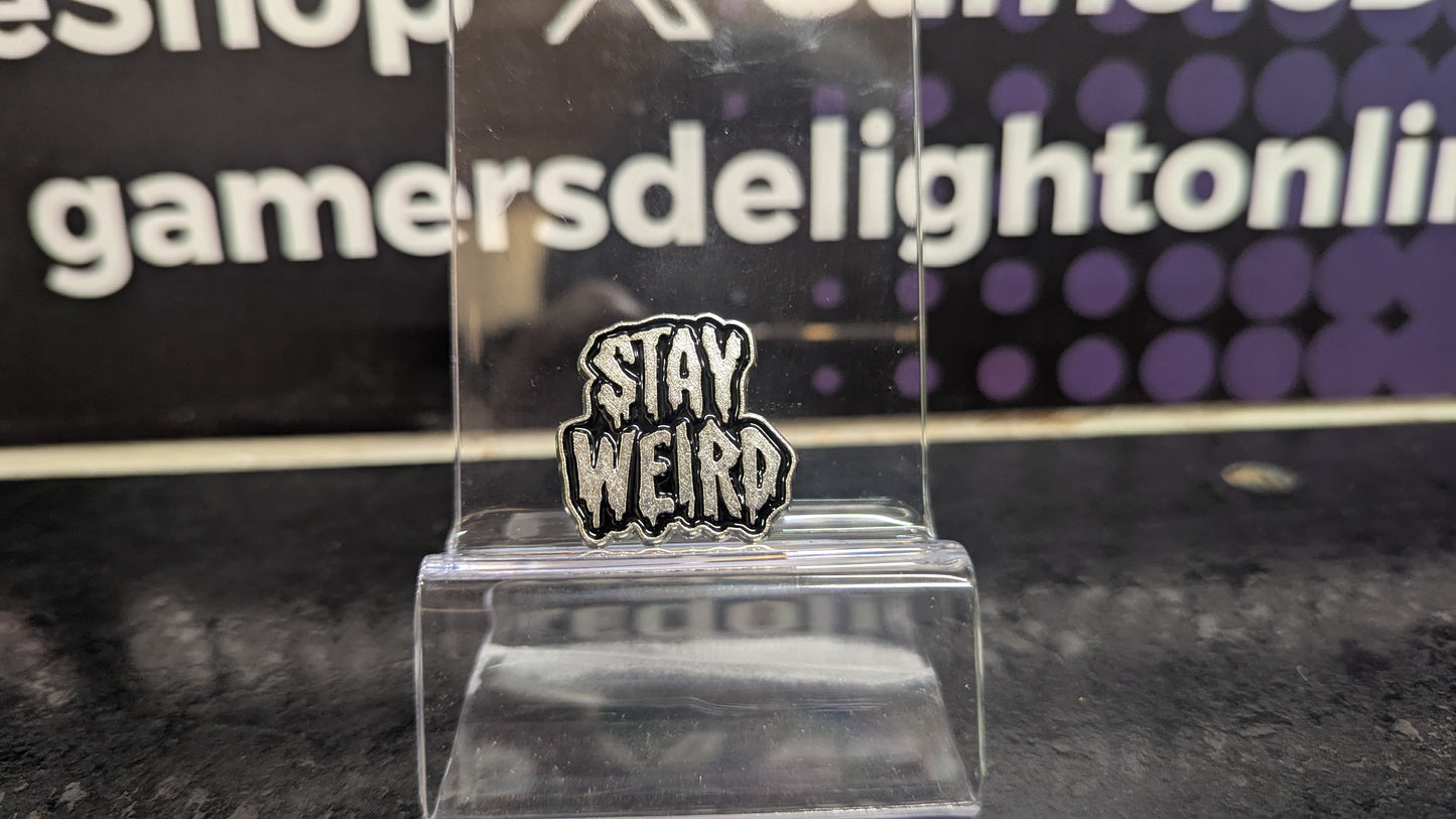 Stay weird pin badge